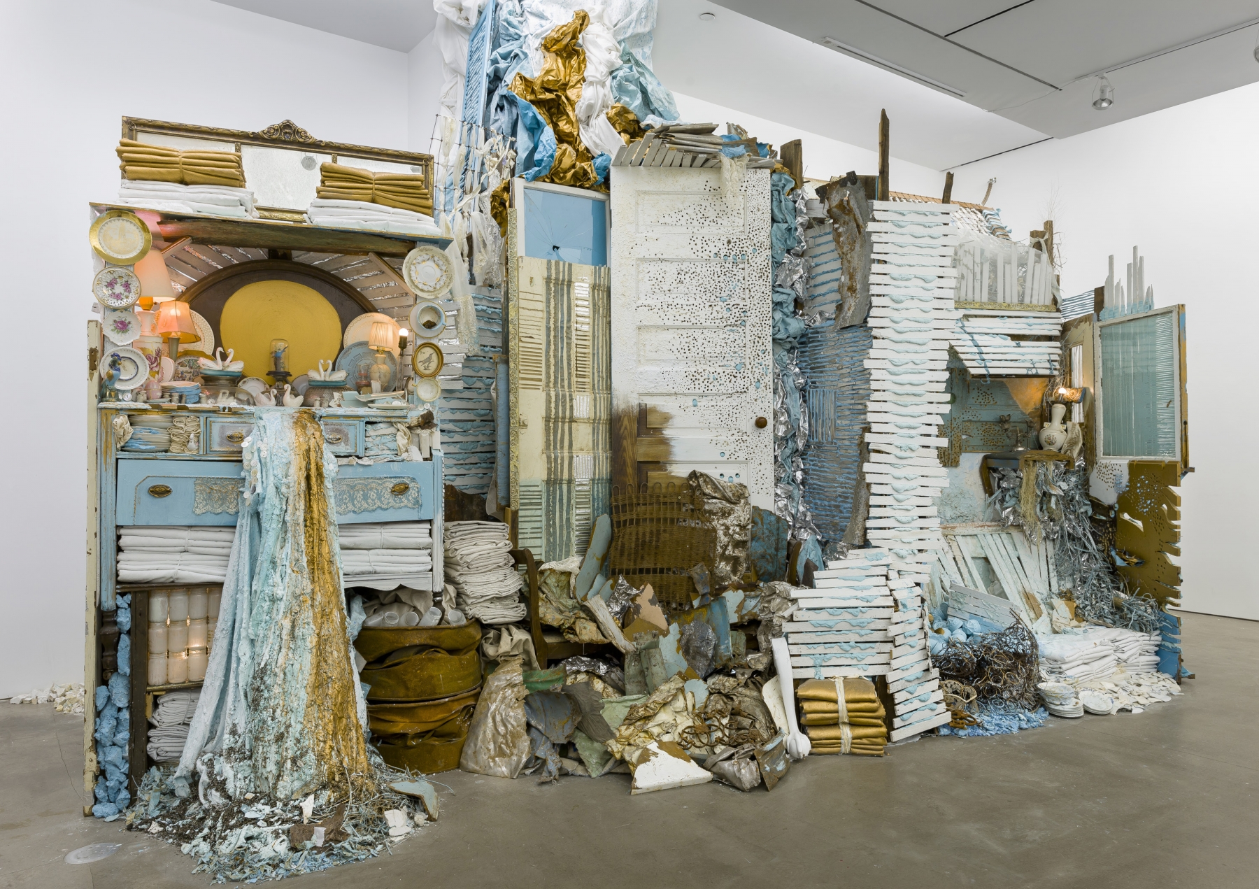 &amp;quot;Swan Song&amp;quot;, 2015, reclaimed lath, wood, marble, iron, paper, vintage furniture, dishware, figurines, natural debris, crushed reclaimed metal, light fixtures, vintage wedding dresses, bathtub, wallpaper, plaster, and paint.